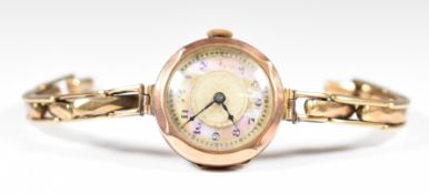 Buren 9ct gold ladies wristwatch with blued hands, abalone chapter ring, black Arabic numerals and