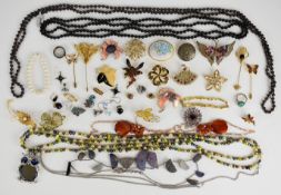 A collection of jeweller, some brooches including Sarah Coventry, Napier, Trifari, etc and necklaces