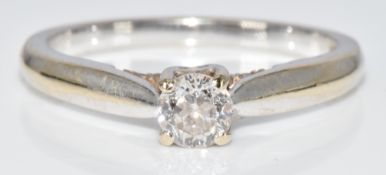 An 18ct white gold ring set with a 0.4ct round brilliant cut diamond, in original box, 3.3g, size N