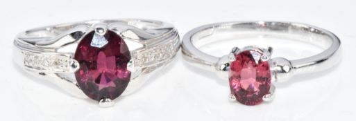 Two 9k white gold rings, one set with an oval cut rubellite and diamonds and the other an oval cut