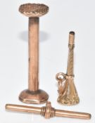 A 9ct gold T bar (2.5g), intaglio seal depicting a table (tests as 9k), and a Victorian watch key