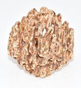 A 9ct gold 1970s textured bark ring, 9.3g, size I/J