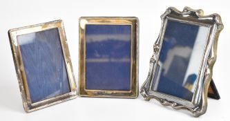 Three modern hallmarked silver photograph frames, the largest to suit 5.5 x 4 inch photo, the