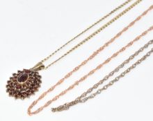 A 14k rose gold chain/ necklace (2.4g, 48cm) two 9ct gold chains (7g, 50 & 60cm) and a silver gilt