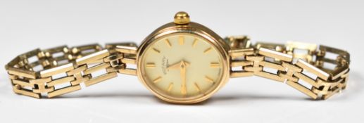 Rotary 9ct gold ladies wristwatch with gold hands and hour markers, champagne dial and quartz