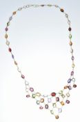 A 14ct gold necklace set with garnets, citrines, amethysts, topaz and peridot, 14.8g, 46cm