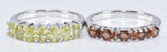 Two 9k white gold rings, one set with zircon and the other sphene, with certificates, 5.1g, size N