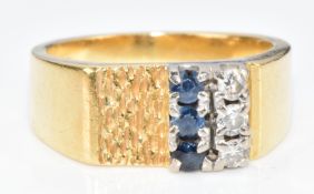 An 18ct gold ring set with three round cut sapphires and three round cut diamonds, 8.7g, size M