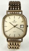 Marvin Revue 9ct gold gentleman's wristwatch with date aperture, two-tone hands and baton hour