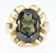 A 14k gold ring set with an oval cut synthetic spinel, 4.8g, size M/N