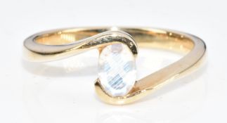 A 9ct gold ring set with an oval cut moonstone, 2.5g, size N,