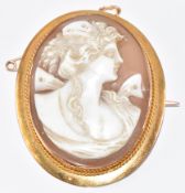 A 9ct gold brooch set with a cameo depicting a young woman, 8.9g, 3.2 x 4cm