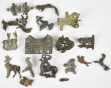 Mainly Roman and medieval bronze brooches and pendants, some zoomorphic, tallest 3cm