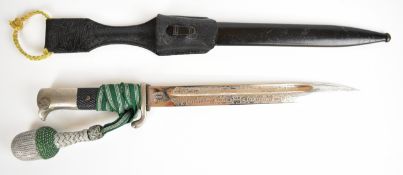 German parade bayonet the 24.5cm blade with etched design showing battle scenes and gothic text, '