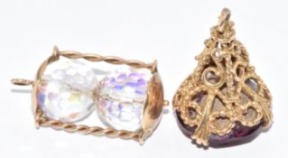 Two 9ct gold charms, one set with two crystal beads and the other a fob set with paste, 16g, 2.5cm
