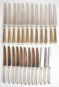 Elizabeth II hallmarked silver handled knives comprising 12 each of dinner and dessert of luncheon