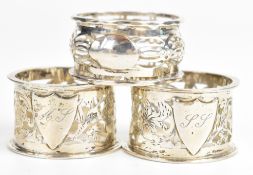 Three hallmarked silver napkin rings to include a pair, Birmingham 1905, maker Jones & Crompton,