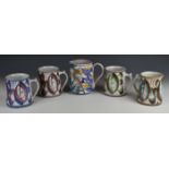 Poole Pottery jug and four Alan Caiger Smith tankards