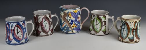 Poole Pottery jug and four Alan Caiger Smith tankards