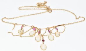 A 9ct gold necklace set with oval cut pink sapphires and six opal cabochons, 5.2g, 45cm