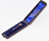 A 9ct gold Masonic stick pin, in original box, 0.7g, 4.5cm