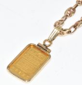 A 9ct gold pendant set with a Johnson Matthey 999 fine gold plaque (1g), on 9ct gold chain made up