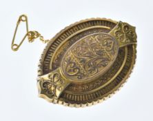 Victorian 9ct gold brooch with engraved and embossed decoration, 6.5g, 4cm