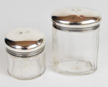 Two John Collard Vickery hallmarked silver topped cut glass dressing table pots, London 1913/14,