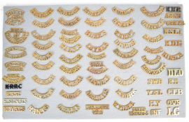 Sixty eight brass military shoulder titles including Notts and Derby, Duke of Wellingtons, Prince of