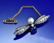 Victorian brooch set with a round cut sapphire of approximately 1ct, a natural saltwater pearl of