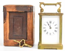 19th or early 20th century gilt brass cased carriage clock with white enamel dial, height