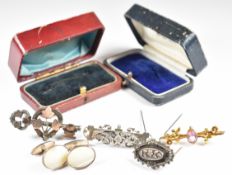 A c1900 9ct gold brooch (1.8g), three c1900 silver brooches one in the form of a key and heart