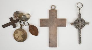 Victorian white metal cross engraved with details of two children (60.7g), a Saint Benedict