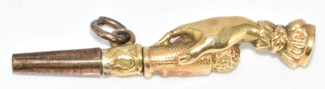 Victorian yellow metal watch key in the form of a lady's hand holding a walking cane / parasol, 2.