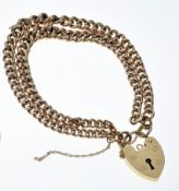 A 9ct gold double strand curb link bracelet with more modern heart clasp, 32.5g, 18cm