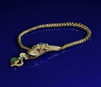 Victorian yellow metal serpent/ snake bracelet set with emeralds & split pearls with garnet eyes,