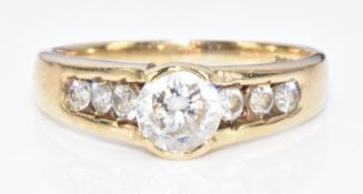 A 14k gold ring set with cubic zirconia, 3.4g, size R