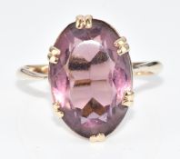 A 9ct gold ring set with paste, 2.7g, size N