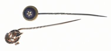 Victorian 9ct gold stick pin in the form of a knot (2.7g, 6.2cm) and a yellow metal Victorian