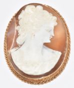 A 9ct gold brooch set with a cameo depicting a young woman, 18g, 6.2 x 4.6cm
