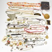 A collection of jewellery including vintage necklaces, French jet beads, Avon, gold plated multi