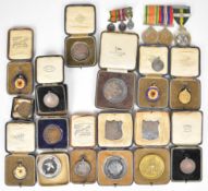 Large collection of 9ct gold, silver, bronze and WW2 medals and medallions for athletics relating to