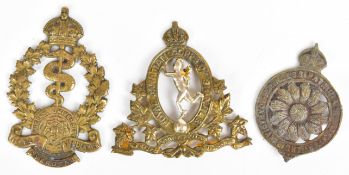 Three WW1 Canadian cap badges comprising 2nd Canadian Queen's University Field Ambulance Overseas,