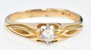 A 14k gold ring set with an oval cut diamond, 2.4g, size J