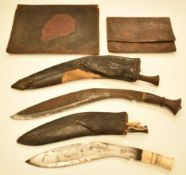 Two kukris, potentially WW2 period, one with 37cm decorated blade and wooden and brass mounted