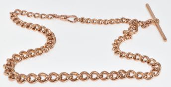 A 9ct gold Albert / watch chain with graduated curb links and T bar, 40.1g, 38cm