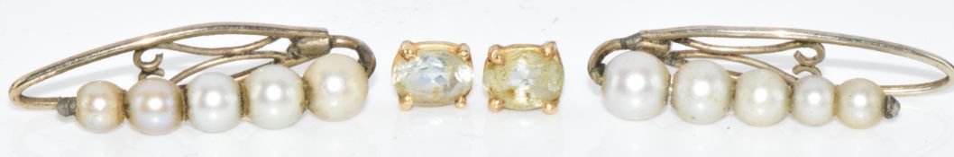 A pair of French 18ct gold earrings set with aquamarines (1.2g) and a pair of white metal earrings