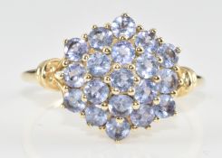 A 9ct gold ring set with a cluster of tanzanites, 2.1g, size P