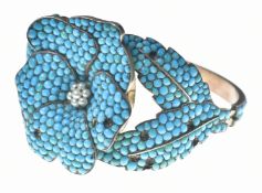 Victorian bangle in the form of a flower and leaves set with turquoise cabochons and a cluster of