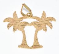 An 18k gold palm tree pendant, 1.3g, 2.5cm
